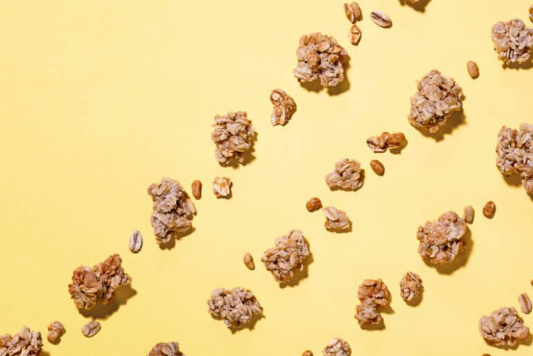 Nature Valley CA granola laid out in multiple lines on a yellow background